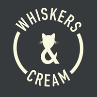 Whiskers & Cream.'s logo